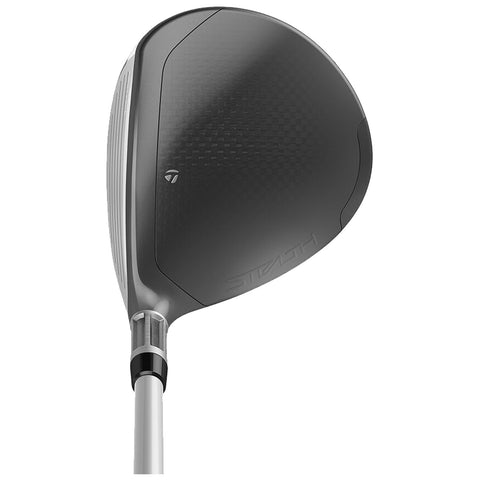 A golf driver with a sleek, aerodynamic black head and a silver shaft is positioned at an upward angle against a plain background showcasing modern design elements and branding potentially indicating performance features.