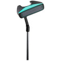 A golf putter stands upright with a black and teal head featuring horizontal grooves on the face its shaft is shiny silver set against a plain white background.