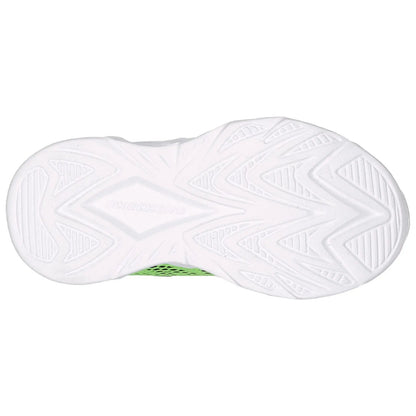 A white sneaker sole features a patterned tread design with grooves and ridges for traction placed on a flat surface showcasing its lightweight structure and design.