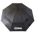 A large black umbrella is open displaying its wide canopy while resting on a flat surface it's designed to provide shelter from rain or sun. The canopy features a logo that reads PRO-TEKT.