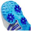 A golf cleat features a white upper and a blue sole with distinct purple traction studs designed for grip on grass. The context is a close-up of the shoe's underside.