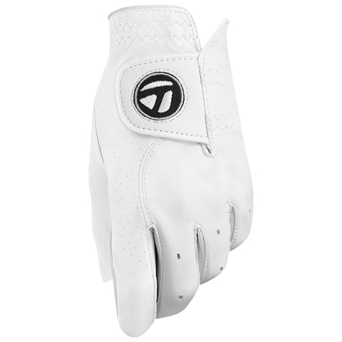 A white golf glove with an adjustable strap is displayed in a close-up view showcasing its smooth leather texture and perforations for breathability against a simple white background.