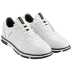 A pair of white athletic shoes with black accents is displayed. They have a sleek design featuring laces and perforated sides, suitable for casual or sports activities.