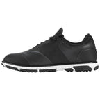 A black athletic shoe with a smooth design and textured side is positioned sideways displaying laces and a rubber sole suitable for outdoor activities on various terrains.