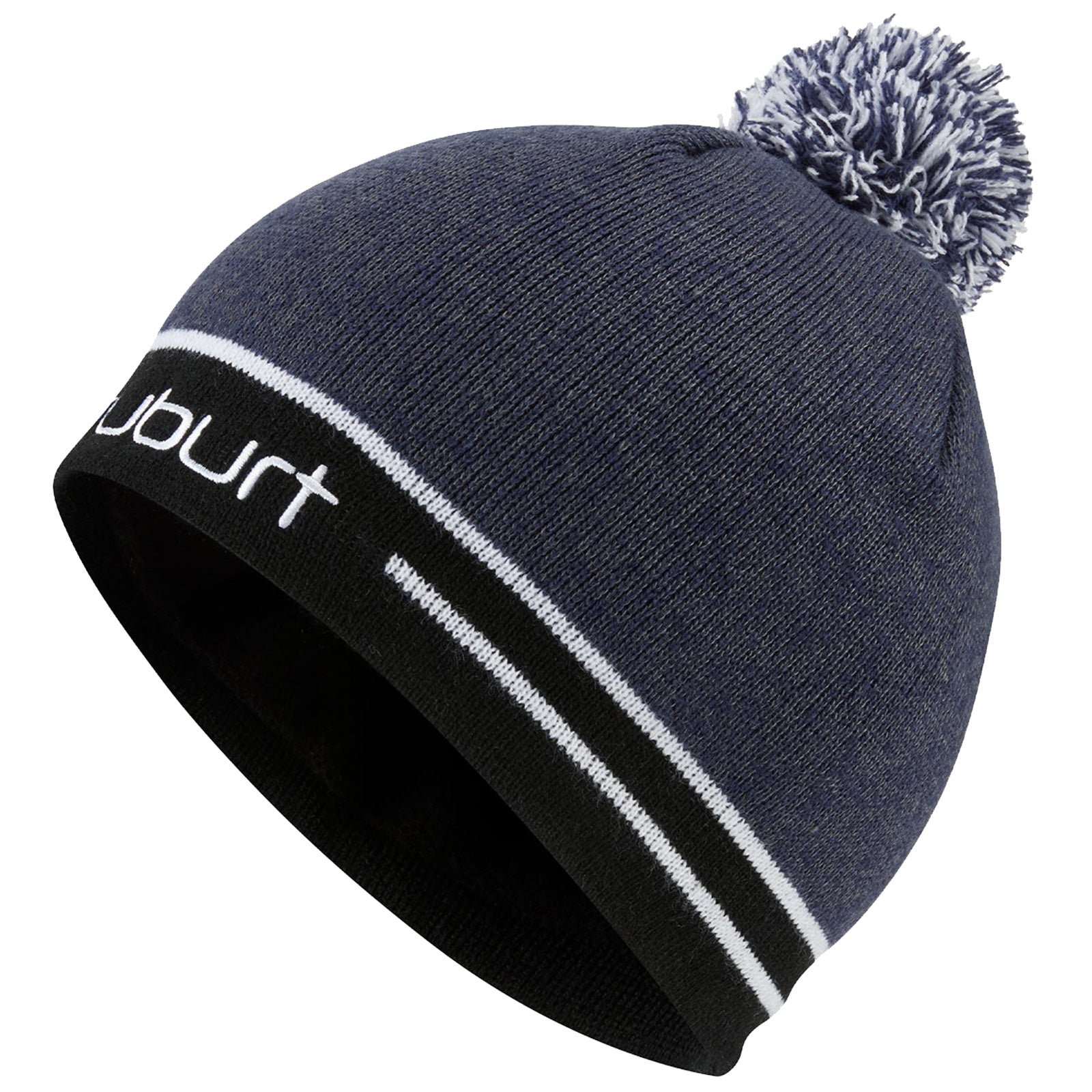 A dark blue knitted beanie hat with a white pompom sits at an angle showing its soft texture and contrasting black and white stripes along the brim adorned with the brand name.
