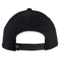 A black baseball cap is shown with its back facing forward featuring a plastic snap closure and ventilation holes in the fabric surrounded by a plain white background