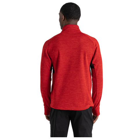 A person is wearing a red long-sleeve top with a high collar in a neutral setting facing away from the viewer, showcasing the garment's design and color against a plain background.