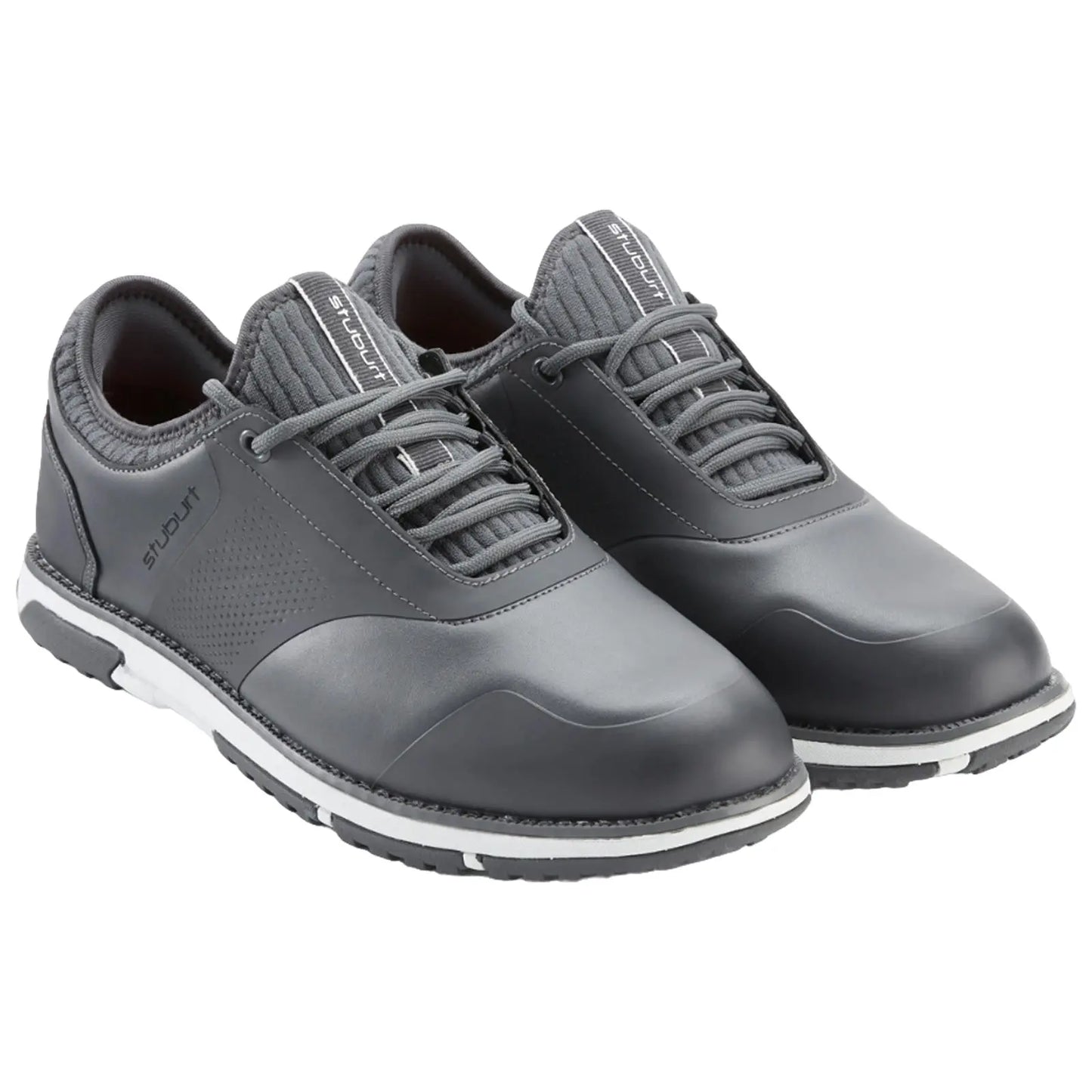 Stylish gray golf shoes feature a sleek design with a textured surface and lace-up closure positioned on a white and black contrasting sole suitable for use on the golf course.