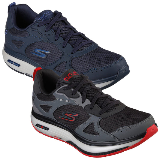Two pairs of athletic shoes are displayed side by side one is navy blue and the other is black with gray accents and red detailing they sit on a white background