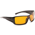 Sunglasses with a sleek black frame and yellow lenses are positioned at an angle. They are designed to protect eyes from bright light, suitable for outdoor activities.