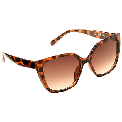 Stylish sunglasses with a tortoiseshell pattern rest at an angle displaying their oversized shape and gradient brown lenses against a neutral background that enhances their fashionable appeal.