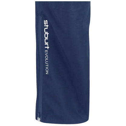 A navy-blue sports garment stands upright featuring a zipper on one side and the text "stuburt EVOLUTION" printed in white along the length, suggesting a stylish, athletic design.