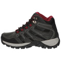A black and gray hiking boot features a high top design with red accents and silver eyelets while positioned on a neutral background emphasizing its sturdy and rugged appearance.