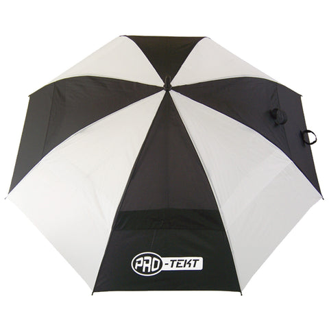 A black and white umbrella opens up displaying alternating sections of color showcasing the brand logo PRO-TEKT on its lower edge while set against a plain background.
