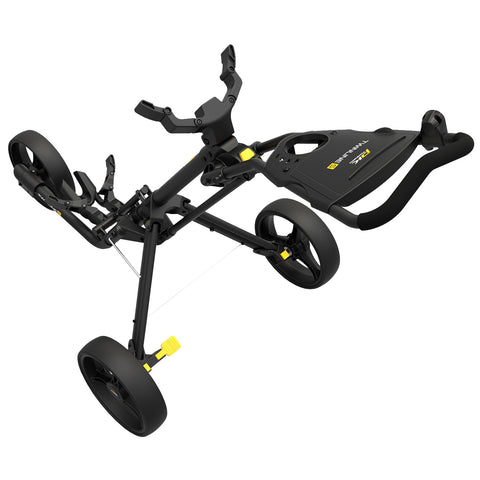 A black golf push cart with two large wheels and a handle is displayed at an angle showing its frame and adjustable components designed for carrying golf bags easily on various terrains.