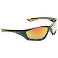 Sunglasses with a black frame and reflective lenses rest at an angle the shiny lenses reflect light suggesting outdoor use likely in a sunny environment.