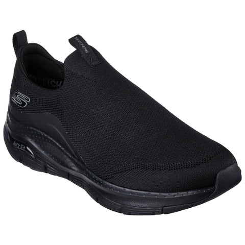A black slip-on sneaker with a knit upper and a cushioned sole is positioned against a neutral background showcasing a sleek design and comfort-oriented features ideal for casual wear.