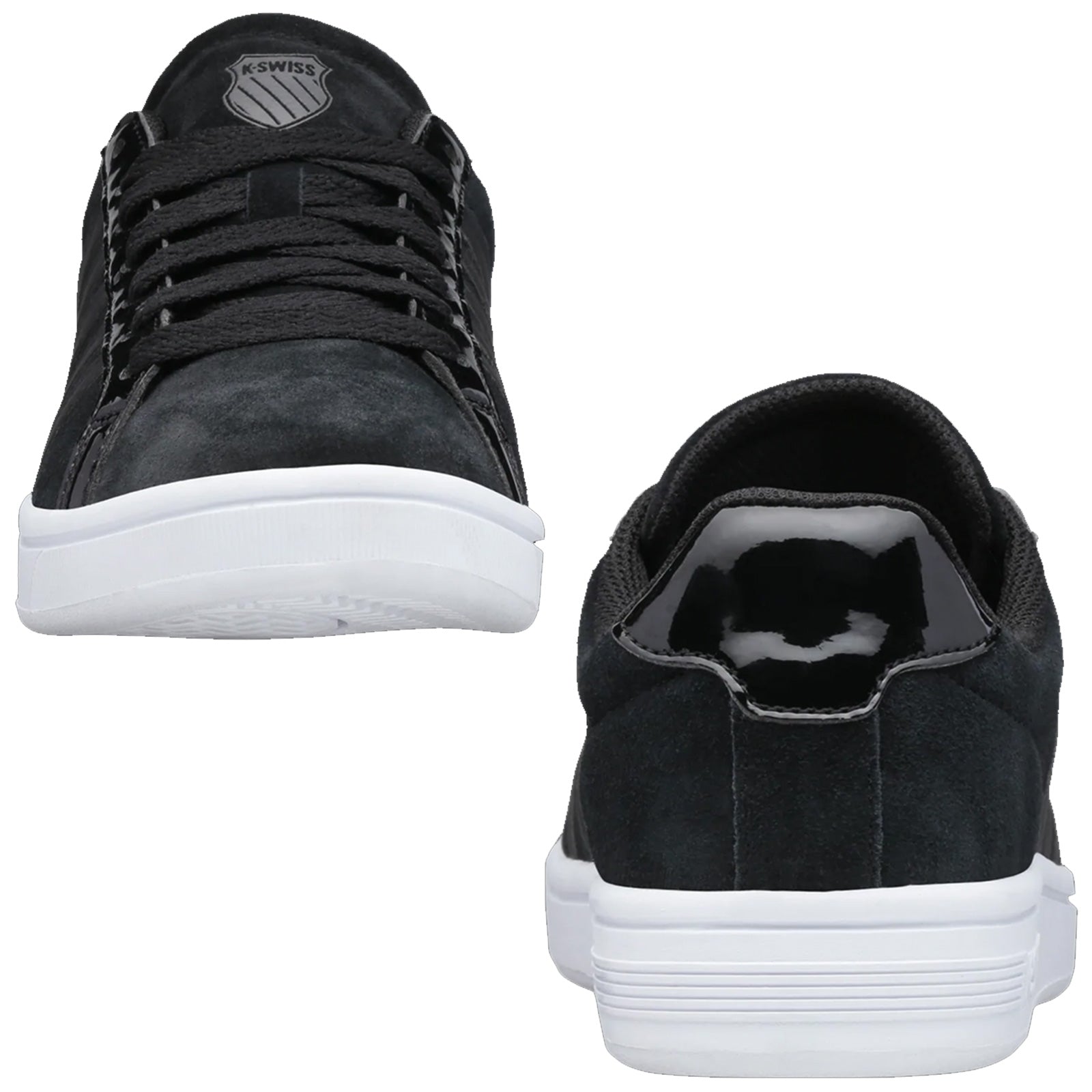 Black athletic shoes are displayed from the front and back showcasing a suede upper and rubber white sole with laces and a sleek design suitable for casual wear.