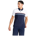 A young man stands confidently wearing a navy blue and white polo shirt with striped details and matching shorts. He is looking to his left, displaying a casual yet stylish demeanor.
