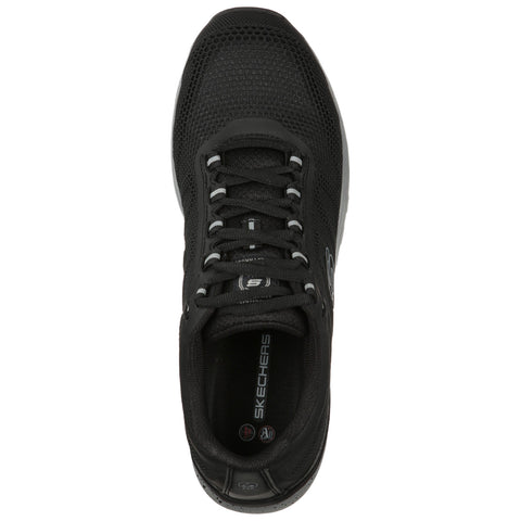 A black athletic shoe is positioned upright with a textured mesh upper and laces visible the surrounding context indicates a neutral background emphasizing the shoe's features and branding.
