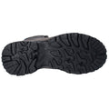 A hiking boot sole is shown resting flat on a surface showcasing deep treads designed for traction with a rugged texture indicating durability and grip for outdoor terrain.