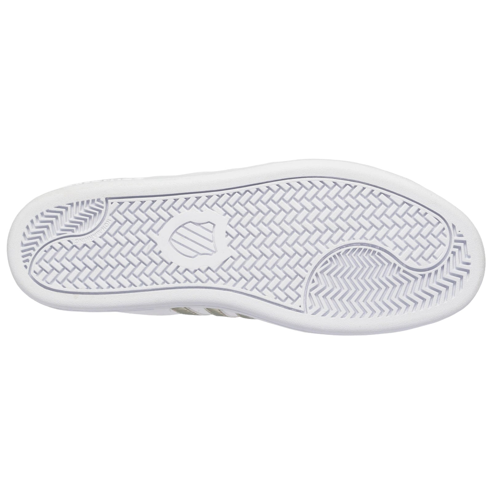 A white sneaker sole features textured patterns designed for traction while resting flat against a plain background, showcasing its clean lines and distinct tread design.