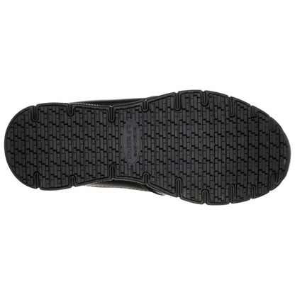 A black shoe sole with a textured surface is displayed from a top-down perspective showcasing the gripping patterns designed for traction and slip resistance in various environments.