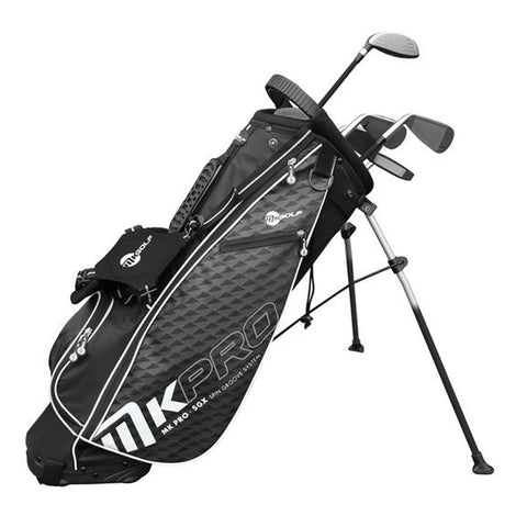 A black and grey golf bag stands upright on two legs holding several golf clubs with a zippered pocket on the side in a neutral background.