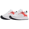 Two athletic shoes are positioned side by side displaying a predominantly white design accented with coral and black elements showcasing a sporty and modern aesthetic suitable for exercise or casual wear