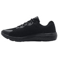 A black athletic shoe has a mesh design and textured sole. It rests on a flat surface, showcasing a modern style suitable for sports or casual wear.