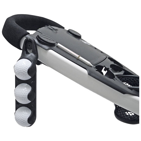 A golf ball retriever features a long handle with a rubberized grip and a storage section for three golf balls alongside a measuring tape, designed for retrieving golf balls from difficult spots.