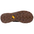 A rugged shoe sole features deep grooves and patterns designed for traction and stability on varied terrains resting against a plain background evident of outdoor activity needs.
