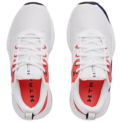A pair of athletic shoes lies flat with a predominantly white mesh upper featuring red accents and black detailing laces are neatly tied inside is a red insole with branding visible