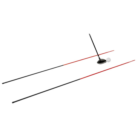 A golf club is positioned above a golf ball poised on the ground between two parallel training sticks used for alignment on a plain background.