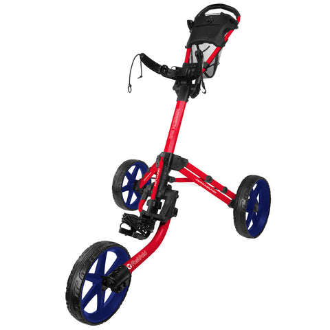 A three-wheeled golf push cart is displayed in a vibrant red color with blue wheels and a secure handle. It is designed for transporting golf clubs on a course.