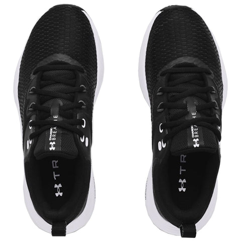 Black athletic shoes are displayed. They feature a textured mesh upper and white soles. The shoes are laid out side by side against a plain background, emphasizing their design and color.