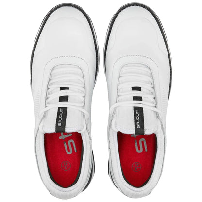 Two white sneakers are displayed from above with black accents laces and a red interior showing. The context suggests a focus on modern athletic footwear design emphasizing clean lines and simplicity.