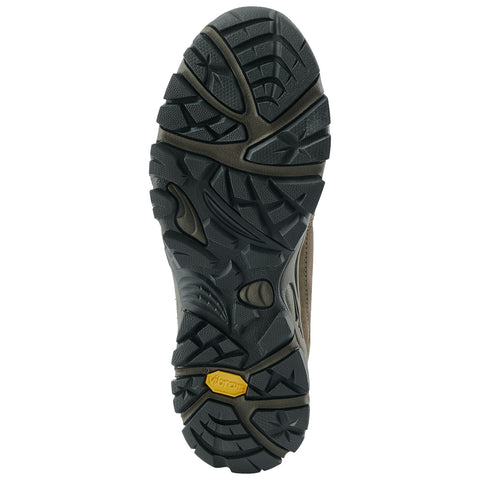 A rugged boot sole features deep treads optimized for traction on various surfaces showcasing a Vibram logo at the bottom highlighting its purpose for outdoor activities and stability.