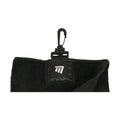A black golf towel with a textured surface is displayed hanging from a clip at the top while featuring a rectangular label with a logo on it in the center.