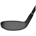A golf club head is angled slightly with the face showing smooth surface and grooves. It is positioned against a plain white background emphasizing its design.