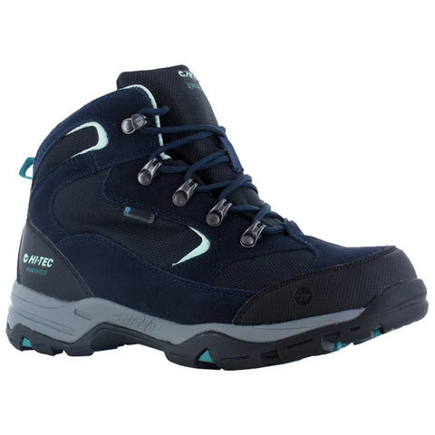 A sturdy dark blue hiking boot features a high ankle design with laces and metal eyelets for secure fitting. The sole is rugged for traction on uneven terrain.