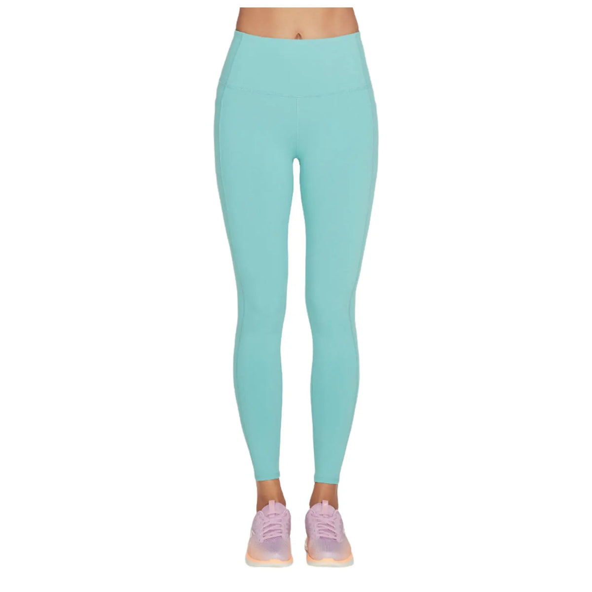 A pair of mint green leggings is displayed with a high waistband and a smooth finish alongside light pink athletic shoes creating a sporty appearance without a visible background.