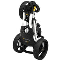 A compact golf pushcart is folded for storage showcasing its black and silver frame and large wheels designed for easy mobility in various terrains.