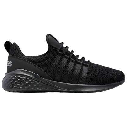 A black athletic sneaker features a mesh upper with crisscross straps and a cushioned sole designed for comfort and support in various activities, set against a plain white background.