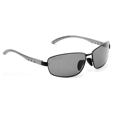 Sunglasses with a dark tint are positioned on a flat surface showcasing a sleek design with metallic arms and side grips suitable for outdoor wear protecting eyes from sunlight.