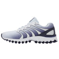 Sneaker featuring a textured upper in white with purple gradient accents laced up for support situated on a flat surface designed for athletic activities and casual wear.