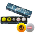 A box labeled Thor contains five golf balls with logos including Marvel and Volvik. The balls are designed for premium play with vibrant colors yellow and white visible prominently.