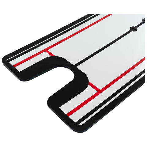A sports referee card features a white surface with black and red lines indicating boundaries and zones it is positioned on a flat surface likely for officiating a game.