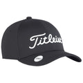 A black cap with a white cursive brand name Titleist prominently displayed on the front is oriented forward against a plain light background.