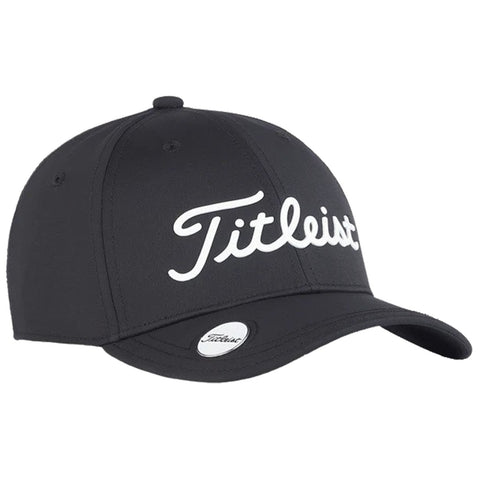 A black cap with a white cursive brand name Titleist prominently displayed on the front is oriented forward against a plain light background.